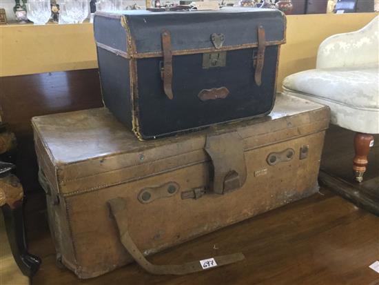 Brown leather trunk & a small black leather trunk